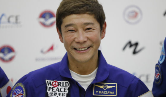 Japanese billionaire Yusaku Maezawa is seen at a 2021 news conference ahead of the expedition to the International Space Station. Maezawa said on June 1 that he has canceled his planned flight around the moon on a Space X spaceship because of uncertainty about when it may be possible.