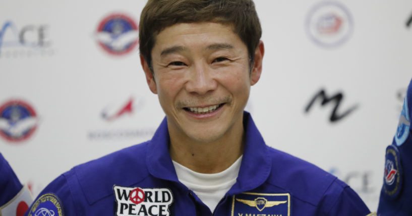 Japanese billionaire Yusaku Maezawa is seen at a 2021 news conference ahead of the expedition to the International Space Station. Maezawa said on June 1 that he has canceled his planned flight around the moon on a Space X spaceship because of uncertainty about when it may be possible.