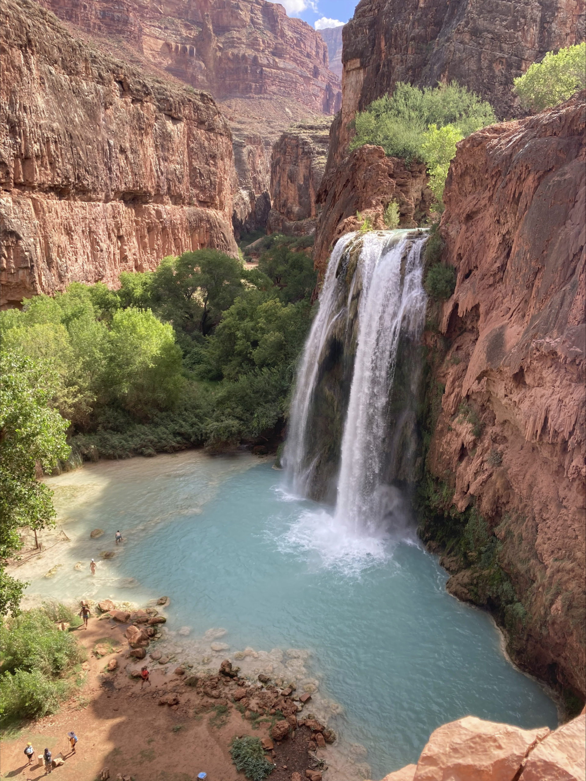 Dozens of tourists have complained of falling ill on a recent visit to a popular and picturesque stretch of waterfalls deep in a gorge neighboring Grand Canyon National Park.