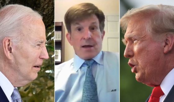 Allan Lichtman, center, a historian at American University, spoke about the upcoming election between President Joe Biden, left, and former President Donald Trump.