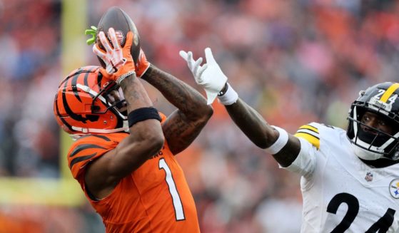 Ja'Marr Chase of the Cincinnati Bengals catches a pass while defended by Joey Porter Jr. of the Pittsburgh Steelers at Paycor Stadium on Nov. 26. Neither team had posted about LGBT "Pride Month" by June 4.