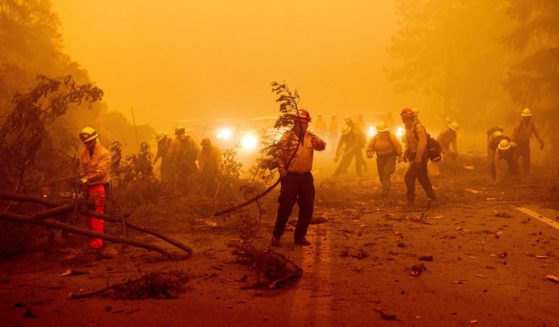 firefighters battling the Dixie Fire clearing Highway 89