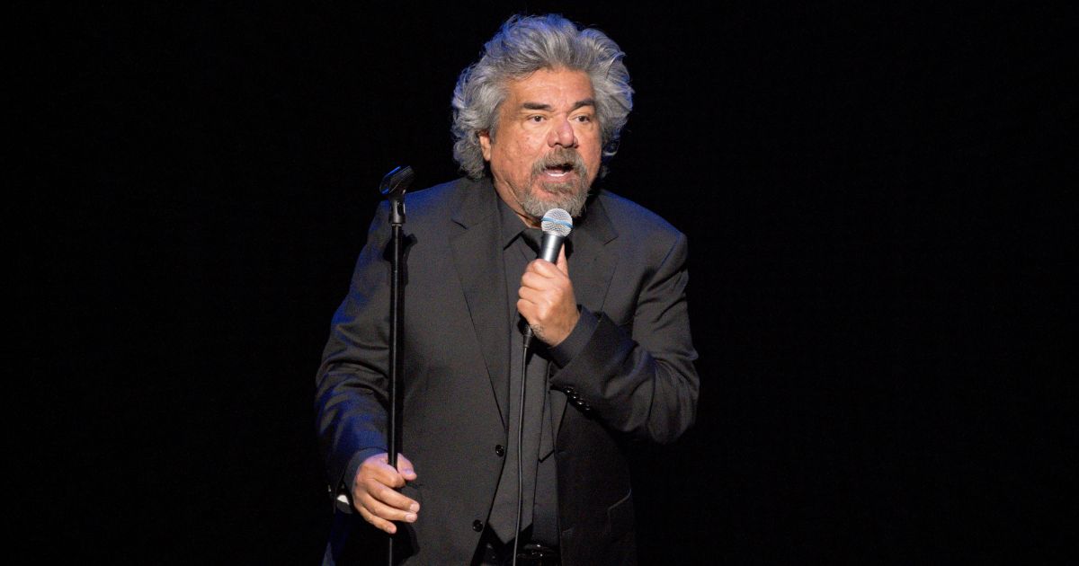 George Lopez performing on stage