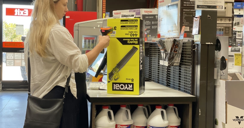 A customer makes a purchase in a self-checkout lane at a Home Depot store in San Rafael, California, last July. Another store, Dollar General, reportedly ended self-checkout at about 3,000 locations just last month.