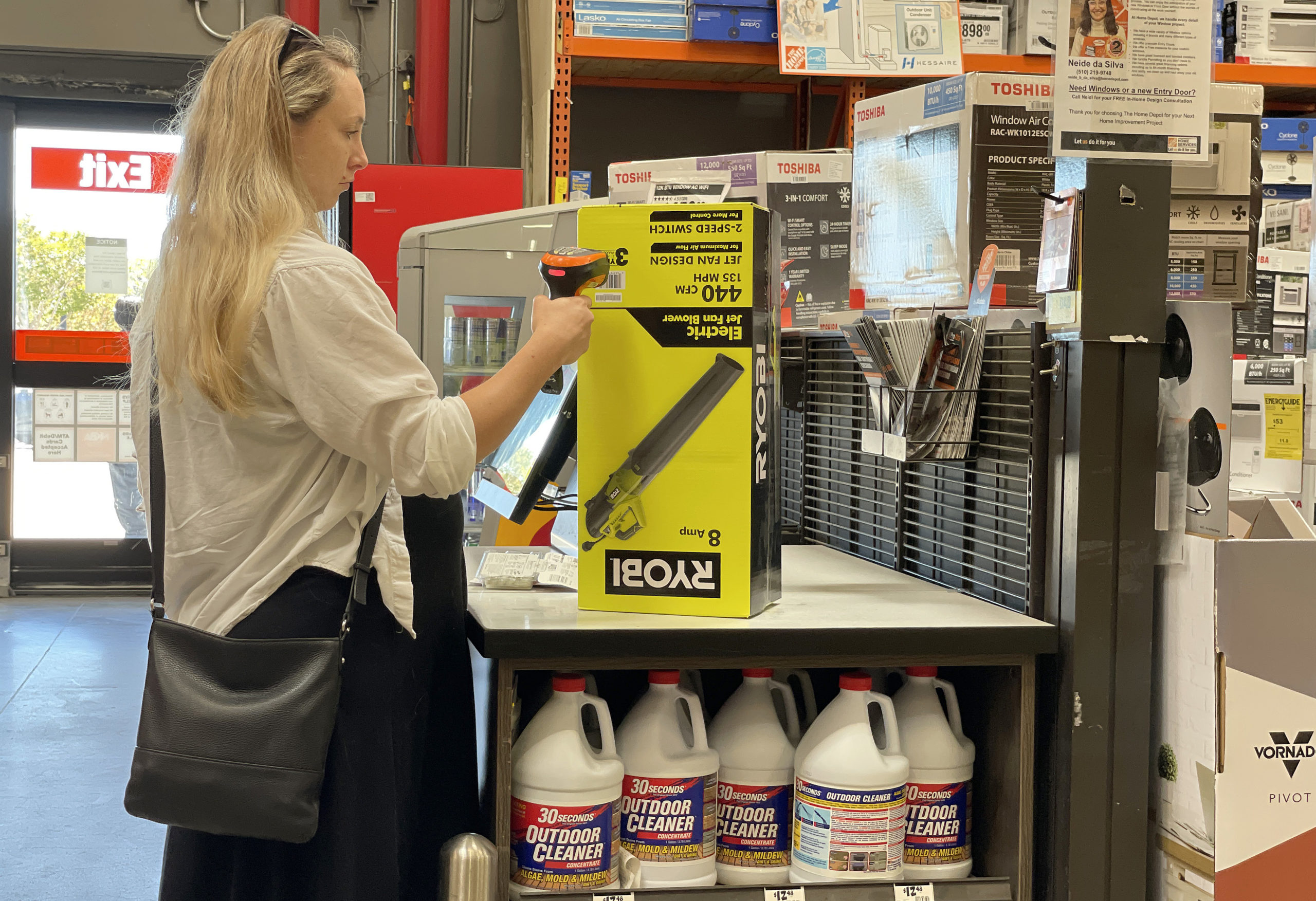 A customer makes a purchase in a self-checkout lane at a Home Depot store in San Rafael, California, last July. Another store, Dollar General, reportedly ended self-checkout at about 3,000 locations just last month.