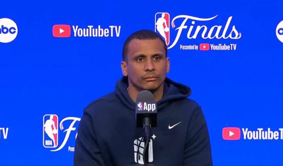 Boston Celtic's NBA Coach Joe Mazzulla responds to a reporter at a news conference concerning the NBA Finals on June 6.