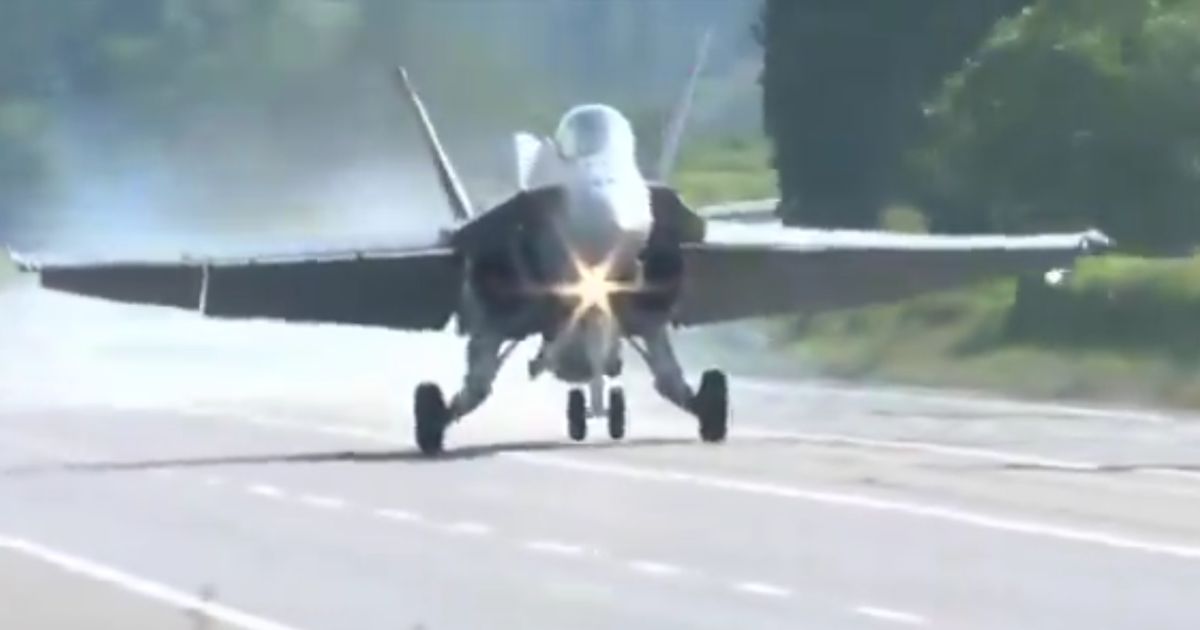 Swiss fighter jets landed on a motorway in a drill to test the military's ability to operate from improvised locations.