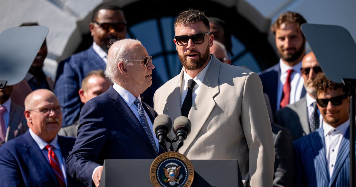 President Joe Biden invites tight end Travis Kelce of the Kansas City Chiefs to speak during an event on the South Lawn of the White House in Washington on May 31.