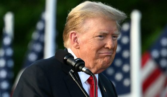 Former President Donald Trump gestures during a campaign rally in the South Bronx in New York City on May 23.