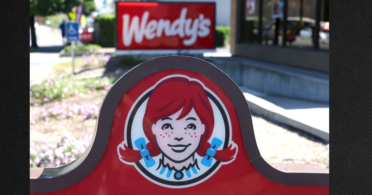 A sign is posted in front of a Wendy's restaurant in Petaluma, California, in a file photo from on August 2022.