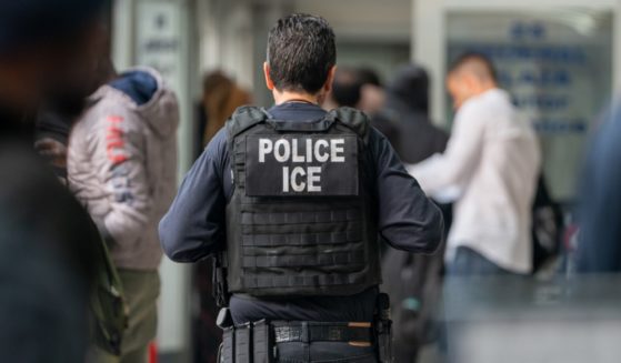 An Immigration and Customs Enforcement agent is pictured from behind in a file photo from June 2023 at the Jacob K. Javits Federal Building in New York City.