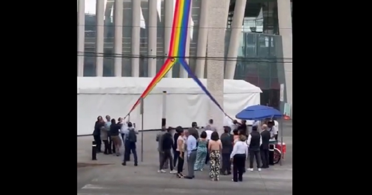 A "pride" flag is ripped from a Mexican government building last week.